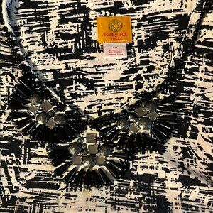 Chic Black and White Patterned Top with Beaded Embellishment